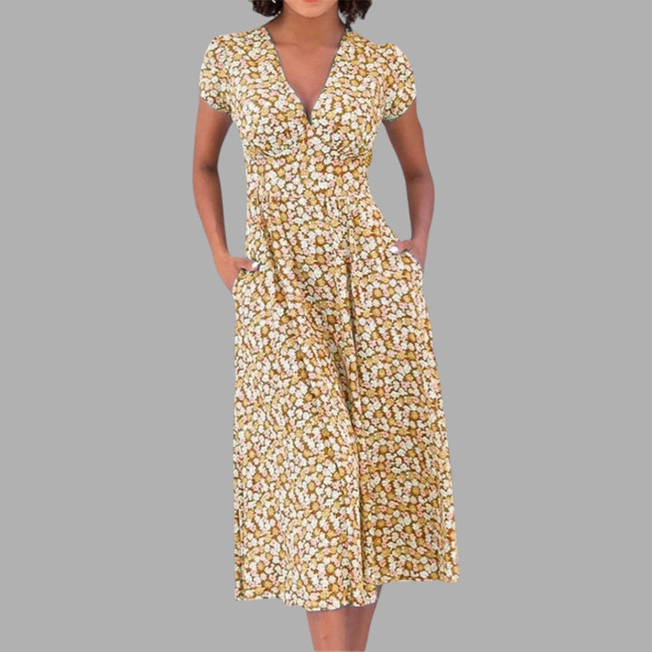 Comfortable beige floral midi dress for women. Chic V-neck, short sleeves, perfect for stylish summer outfits.