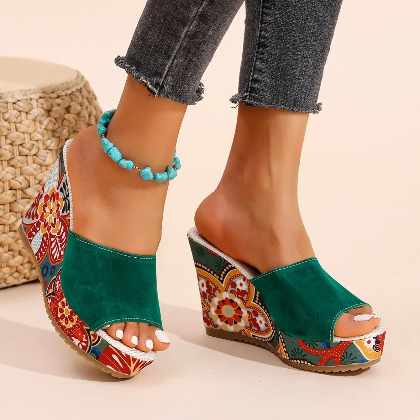 Chic women's floral wedge sandals. Comfortable slip-on footwear with elegant design for effortless style.