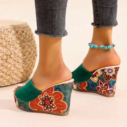 Elegant floral wedge sandals for women. Fashionable and comfortable slip-on footwear, ideal for spring/summer.