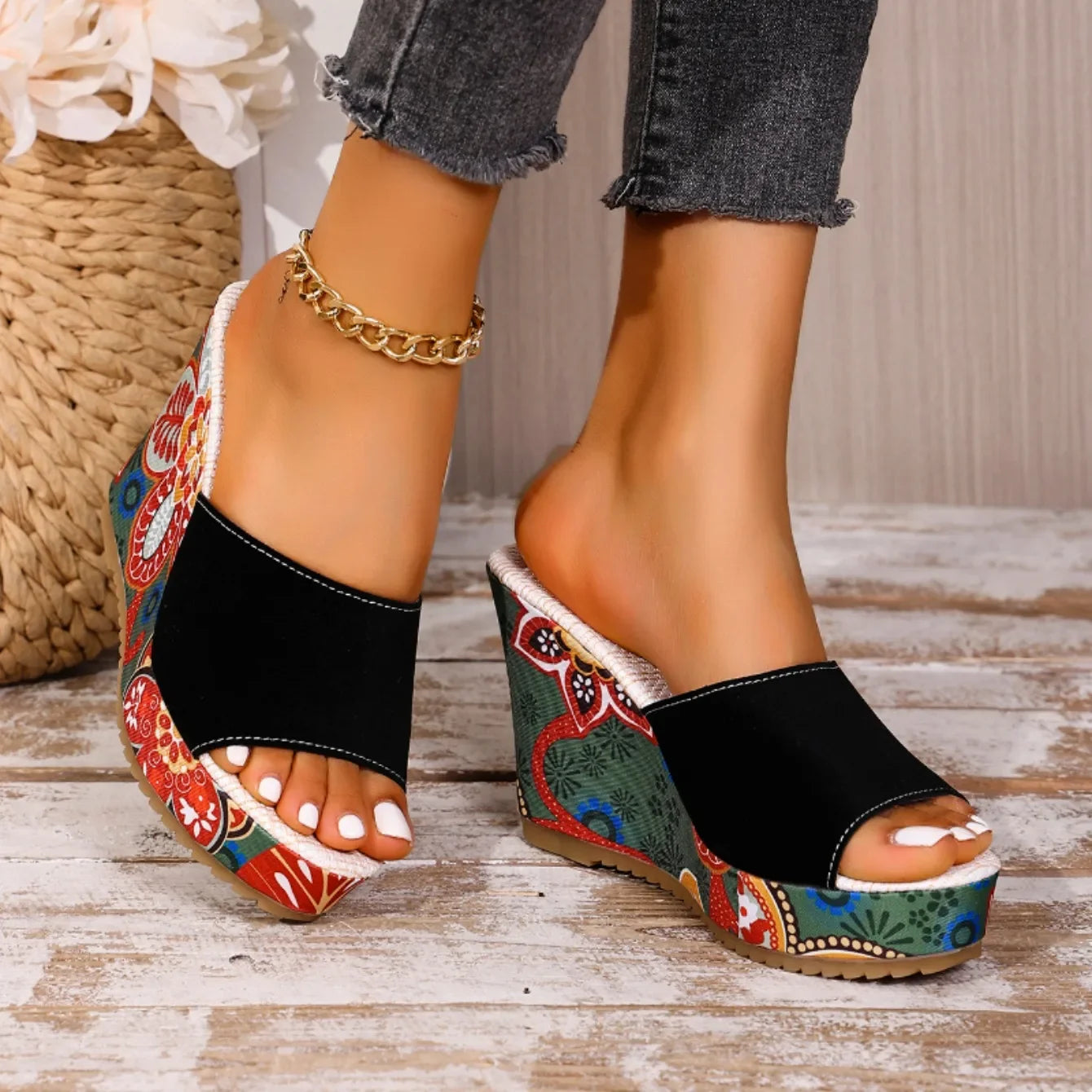 Fashion-forward women's floral wedge sandals. Slip-on footwear designed for elegance and all-day comfort.