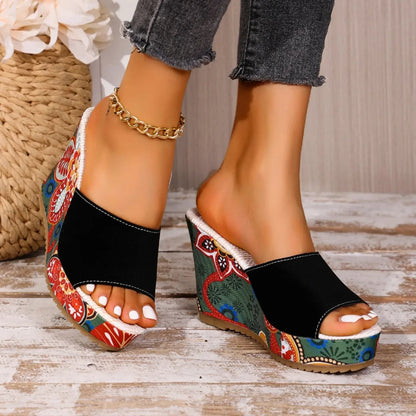 Fashion-forward women's floral wedge sandals. Slip-on footwear designed for elegance and all-day comfort.