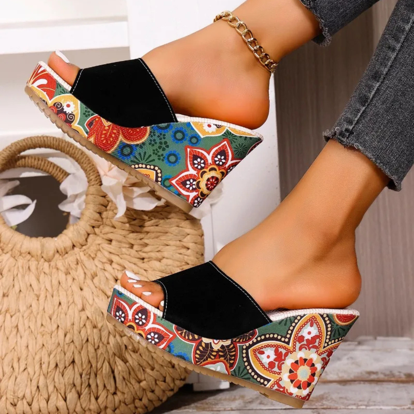 Close-up of women's floral wedge sandals, highlighting the delicate floral pattern and comfortable sole.