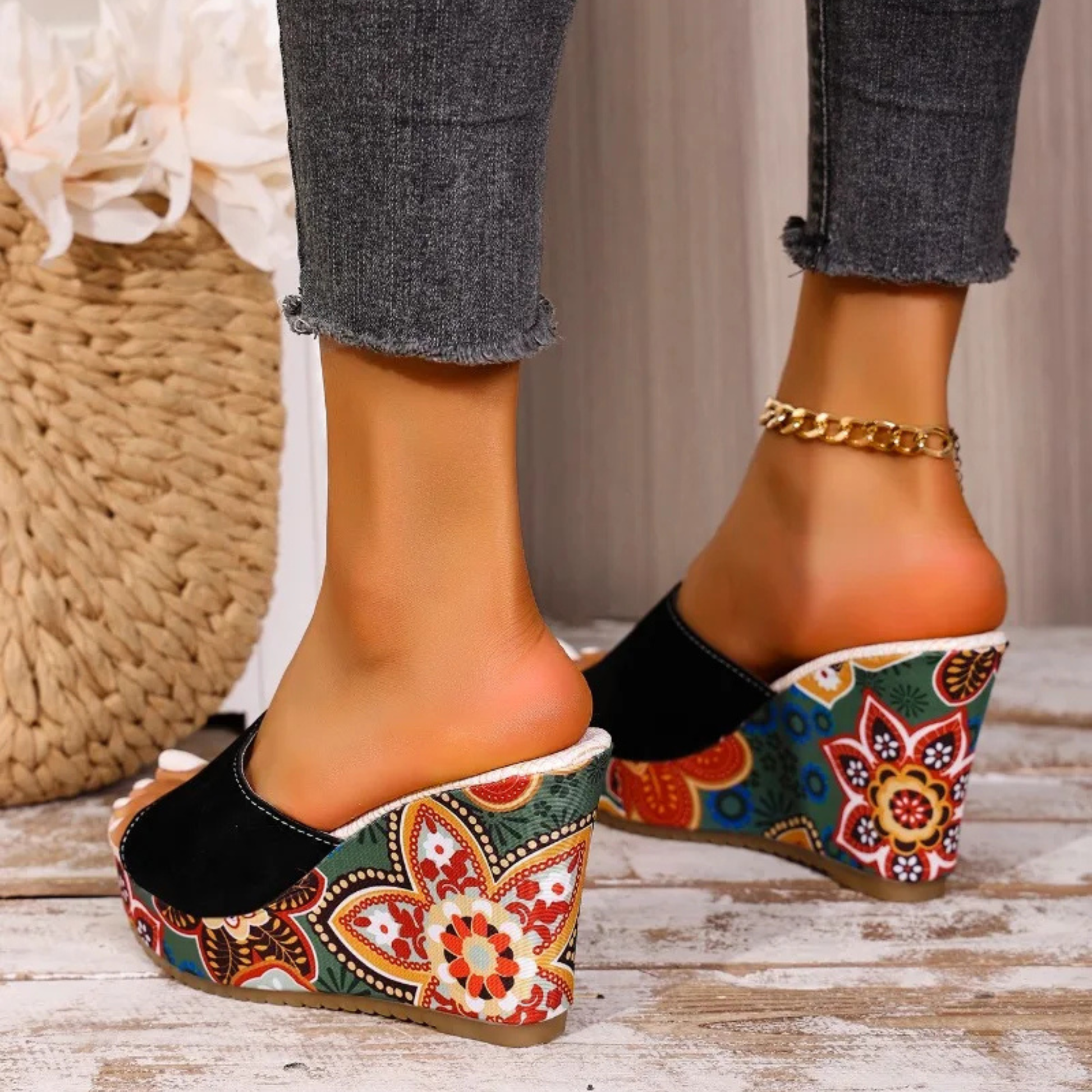 Side view of chic women's floral wedge sandals, showcasing the wedge heel and slip-on design.