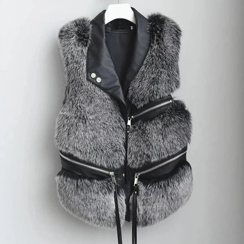 Soft fluffy faux fur vest for women. Chic sleeveless design, ideal cozy outerwear for stylish autumn/winter fashion.