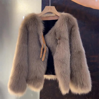 White women's fluffy plush jacket, offering stylish warmth & comfort. Ideal for fall & winter fashion.
