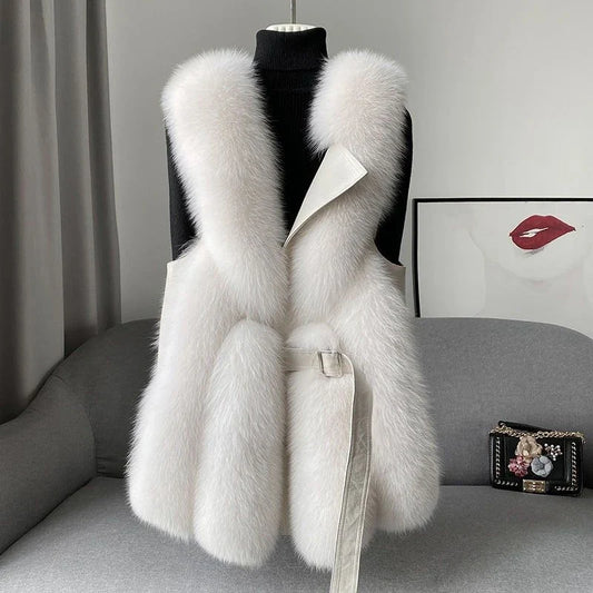 Chic women's fluffy waistcoat in cream, perfect for cozy winter layering. Stylish and elegant fashion vest.