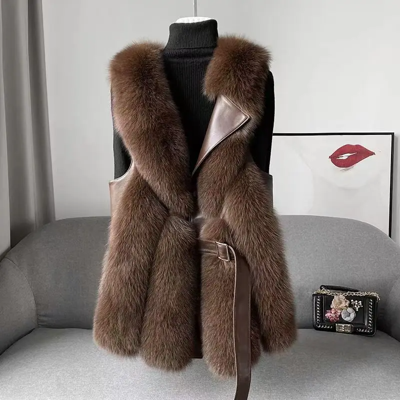 Soft, elegant women's fluffy waistcoat in a warm hue. Stylish and cozy layering vest for cold weather fashion.