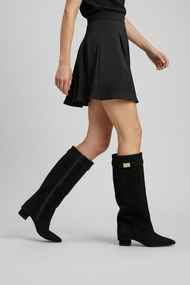 Stylish women's tall boots with a comfortable block heel. Perfect for a sleek, versatile look in fall/winter.