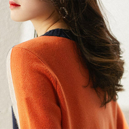 Soft knitted women's long sleeve sweater, offering effortless style and warmth for chilly days.
