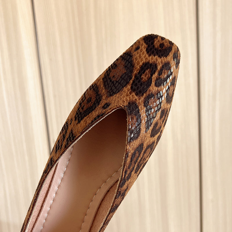 Stylish leopard print women's flats. Comfortable slip-on shoes for chic, fashionable wear.