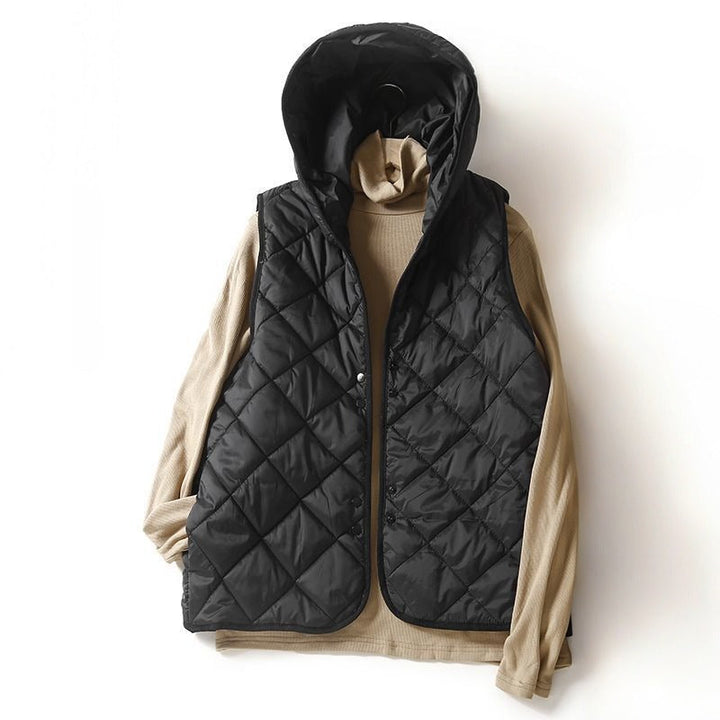 Women's casual quilted hooded vest, lightweight & versatile sleeveless jacket. Perfect for layering.