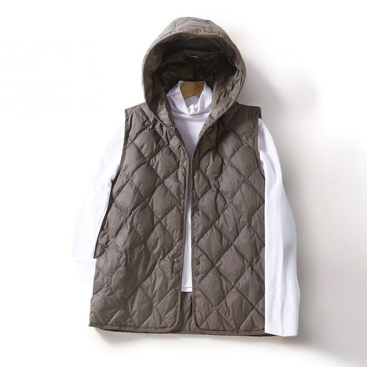 Stylish women's diamond stitch quilted vest with hood. Lightweight outerwear, ideal for fall & spring fashion.