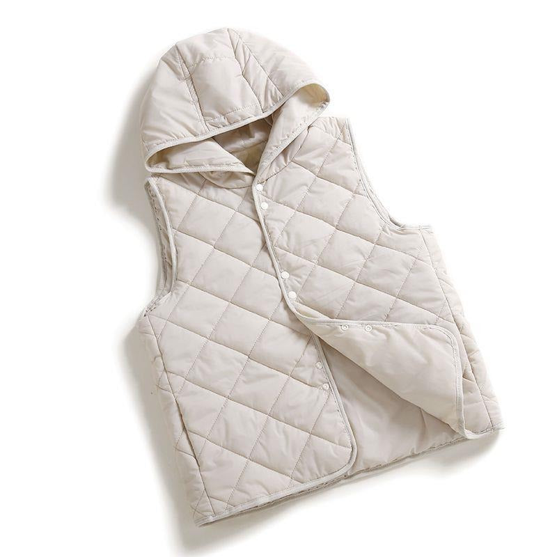 Lightweight women's quilted hooded vest. Diamond stitch design, perfect chic outerwear for spring & fall.