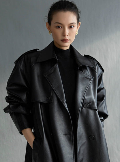 Elegant women's long trench coat, showcasing a flattering silhouette for stylish fall outerwear.