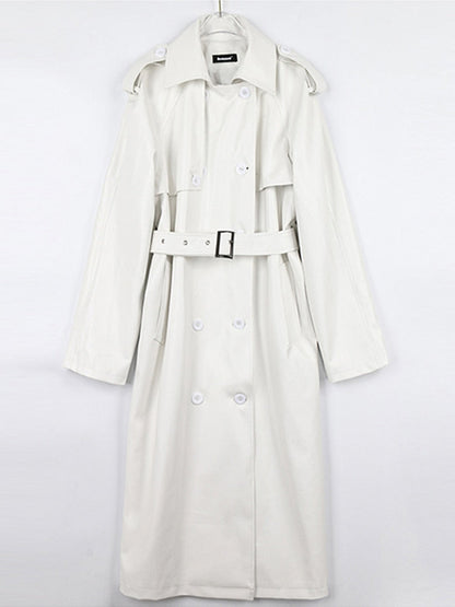Women's chic long trench coat, crafted from quality fabric, a must-have for fall and spring fashion.