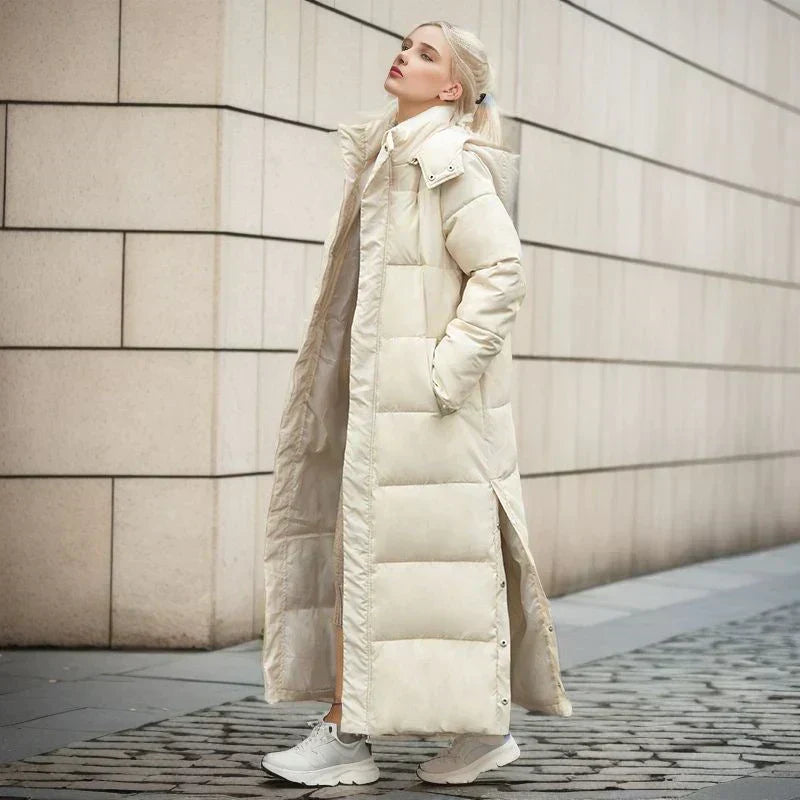 Warm women's long coat with a tailored fit, ideal for stylish winter outfits.