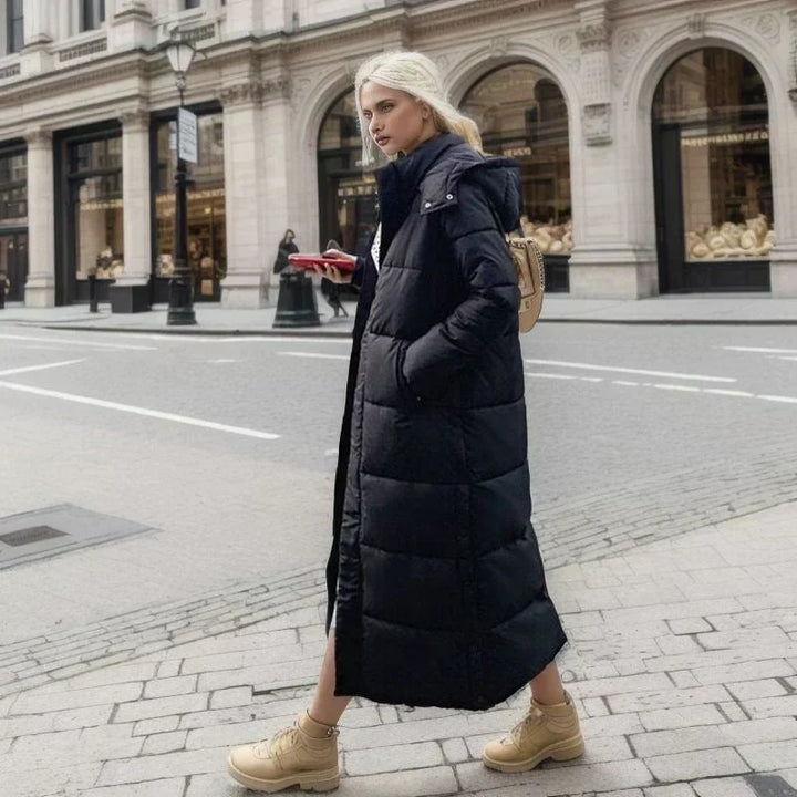 Stylish long women's coat with a belted waist for a chic, flattering look.