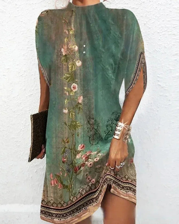 Model wearing a stylish women's mock neck cape sleeve mini dress, perfect for an elegant party look.