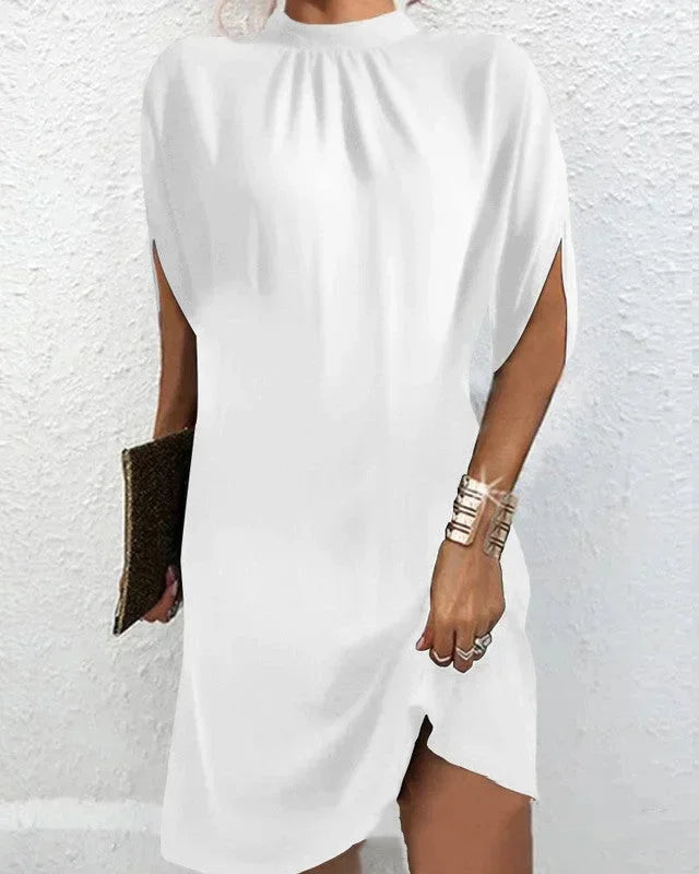 Casual yet chic women's mini dress: mock neck, cape sleeves, ideal for spring or summer outings.