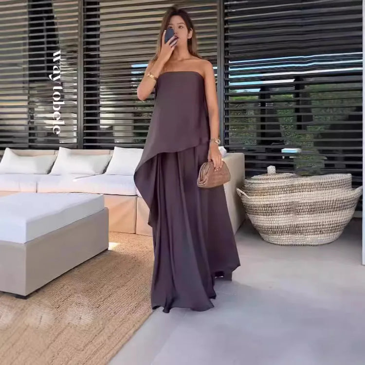 Fashionable women's matching off-shoulder crop top and maxi skirt two-piece set for stylish outfits.