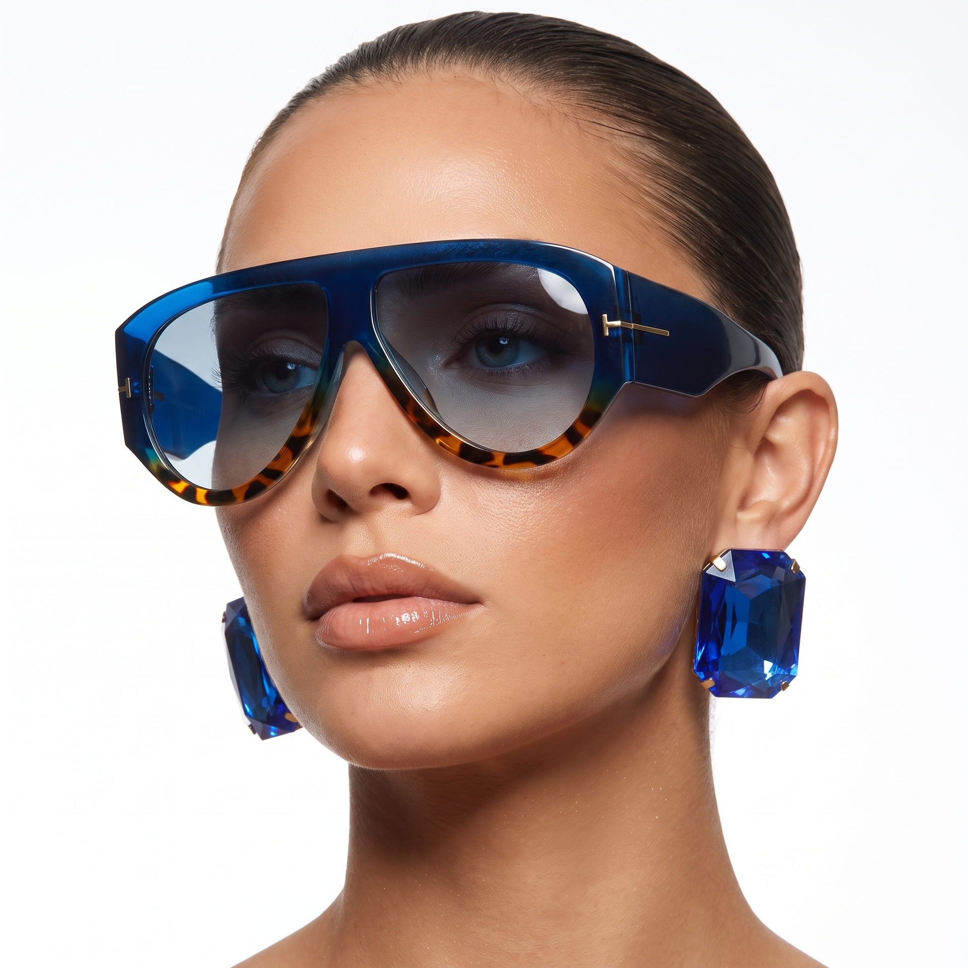 Stylish women's oversized sunglasses featuring a modern color block design and full UV protection.