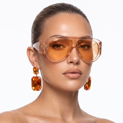 Women's statement oversized sunglasses with trendy color block design and essential UV eye protection.