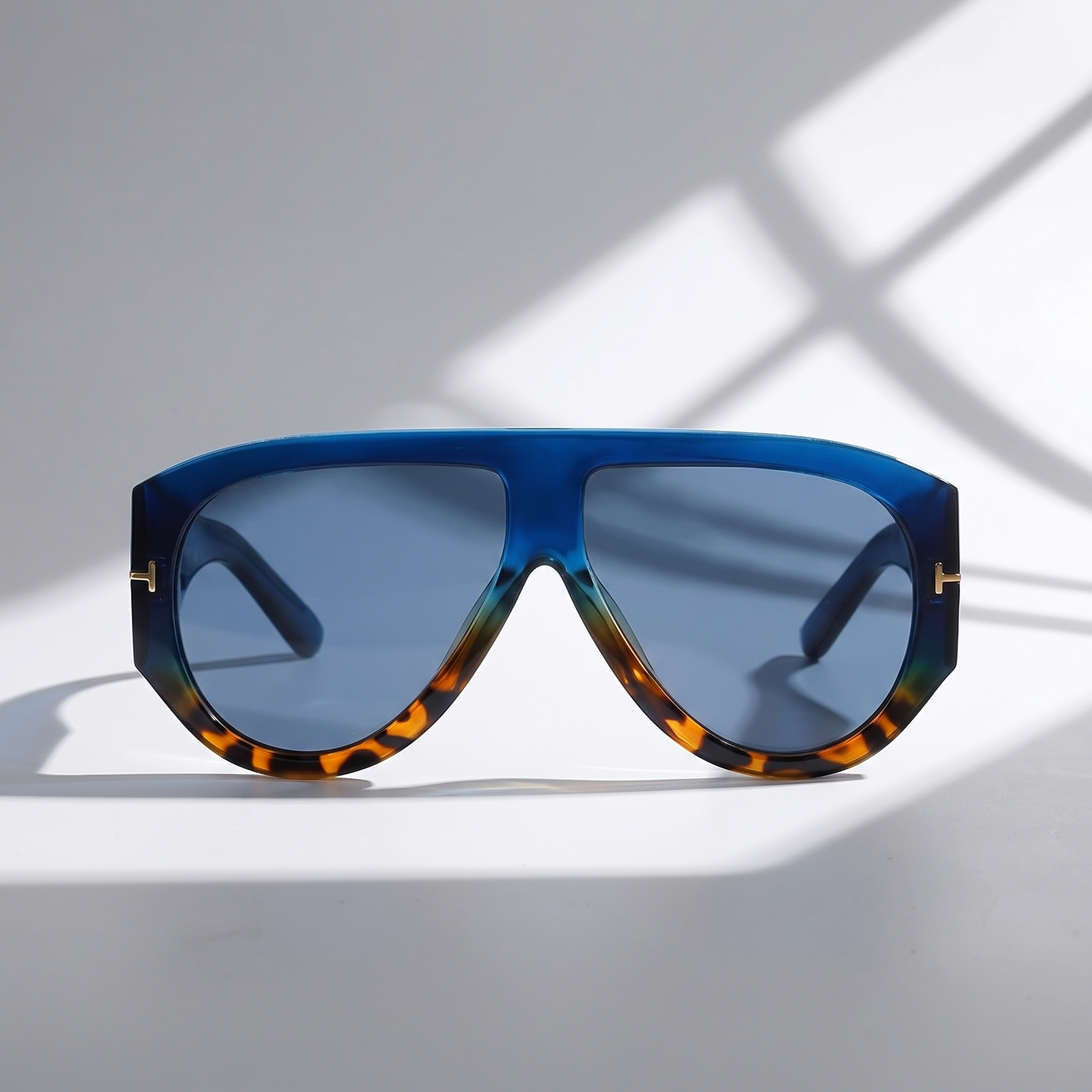 Bold oversized color block women's sunglasses for a chic look and superior UV eye protection.
