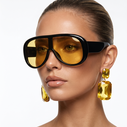 Chic women's pilot sunglasses with UV400 protection. Elegant, modern eye protection accessory.