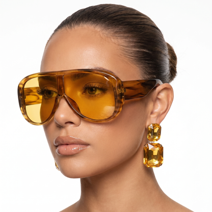 Fashionable women's pilot frame sunglasses, offering UV400 eye protection for a chic look.