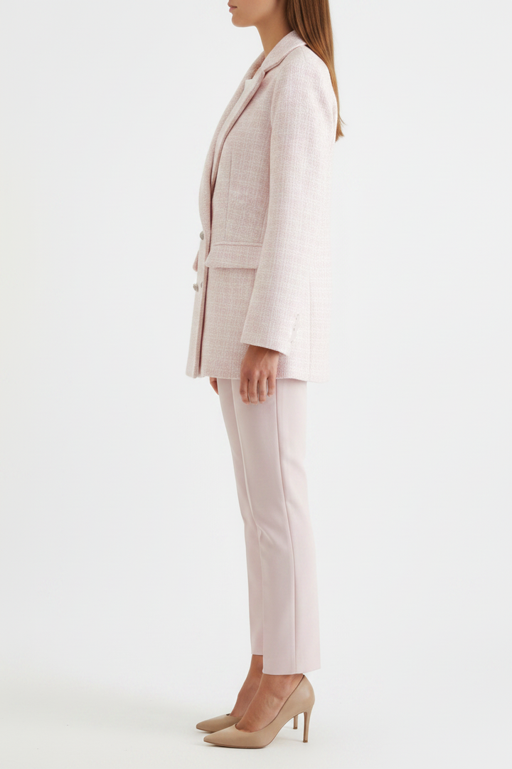 Stylish pink blazer for women, a sophisticated tailored jacket. Ideal for business attire, smart casual, or versatile outerwear.
