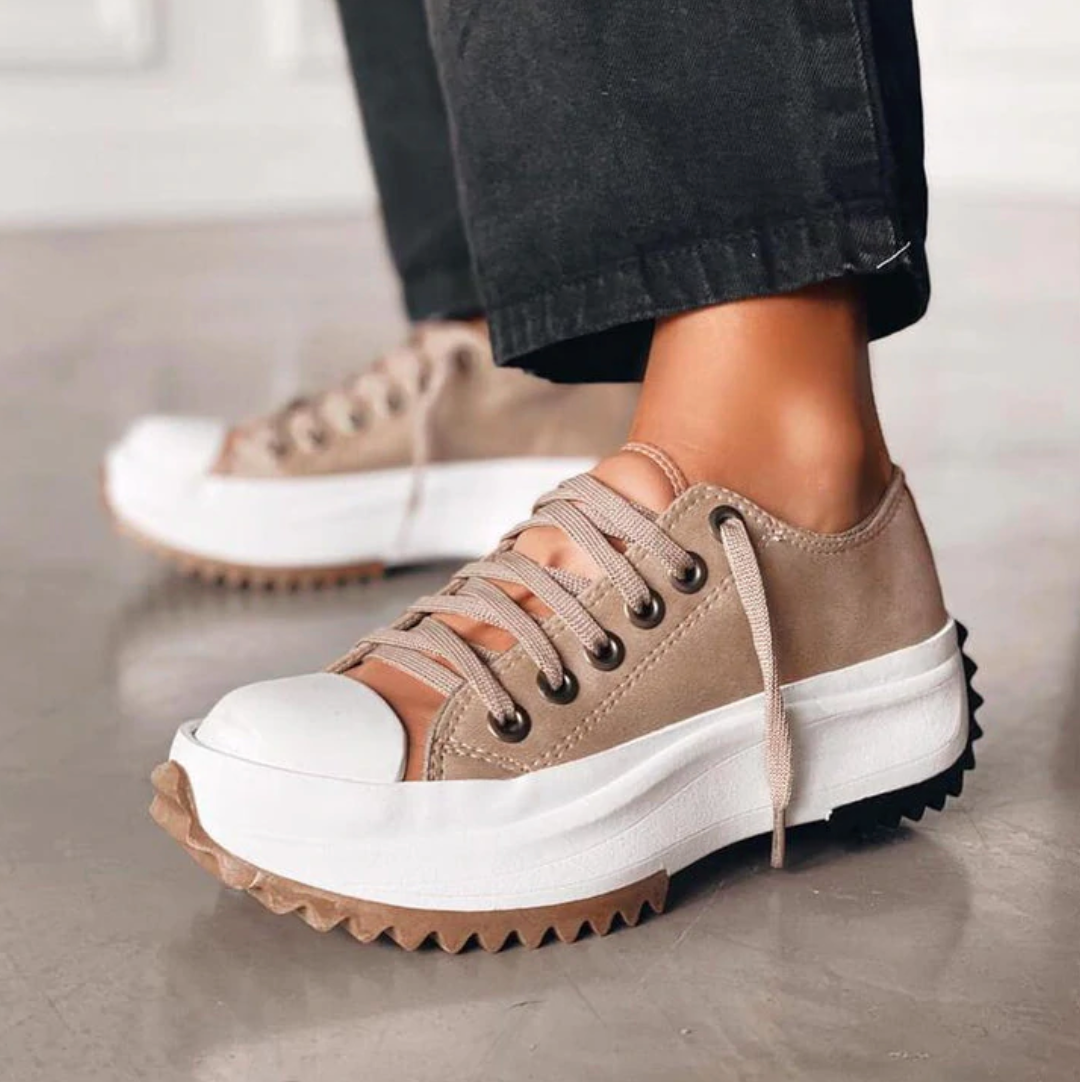 Chic women's platform sneakers, perfect for elevating everyday style and comfort.