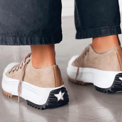Comfortable and trendy women's fashion platform sneakers for casual everyday wear.