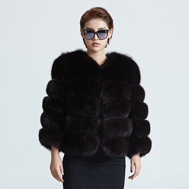 Chic women's plush winter coat, cozy and warm. Stylish outerwear for cold weather fashion.