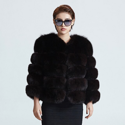 Chic women's plush winter coat, cozy and warm. Stylish outerwear for cold weather fashion.