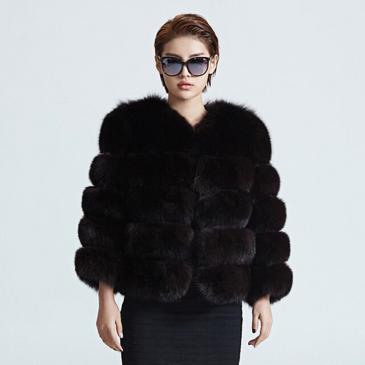 Chic women's plush winter coat, cozy and warm. Stylish outerwear for cold weather fashion.
