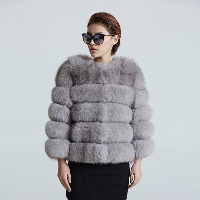 Elegant short women's plush jacket, perfect for chic winter fashion. Cozy and warm outerwear.