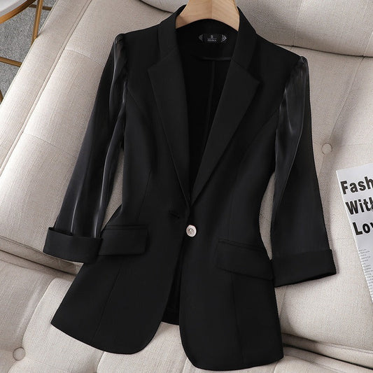 Chic women's power blazer with elegant sheer sleeves. Perfect for professional wear & power dressing. Tailored modern fit.