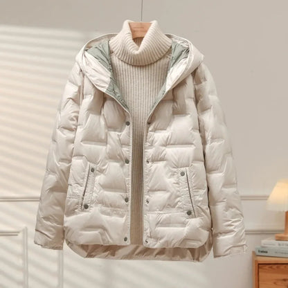 Chic women's quilted puffer jacket, perfect for stylish winter warmth and cold weather fashion.