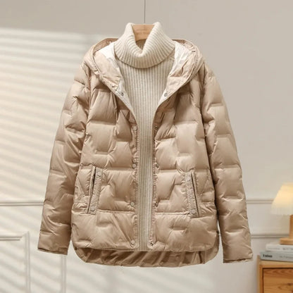 Women's warm puffer jacket, featuring chic quilting for stylish cold weather protection.