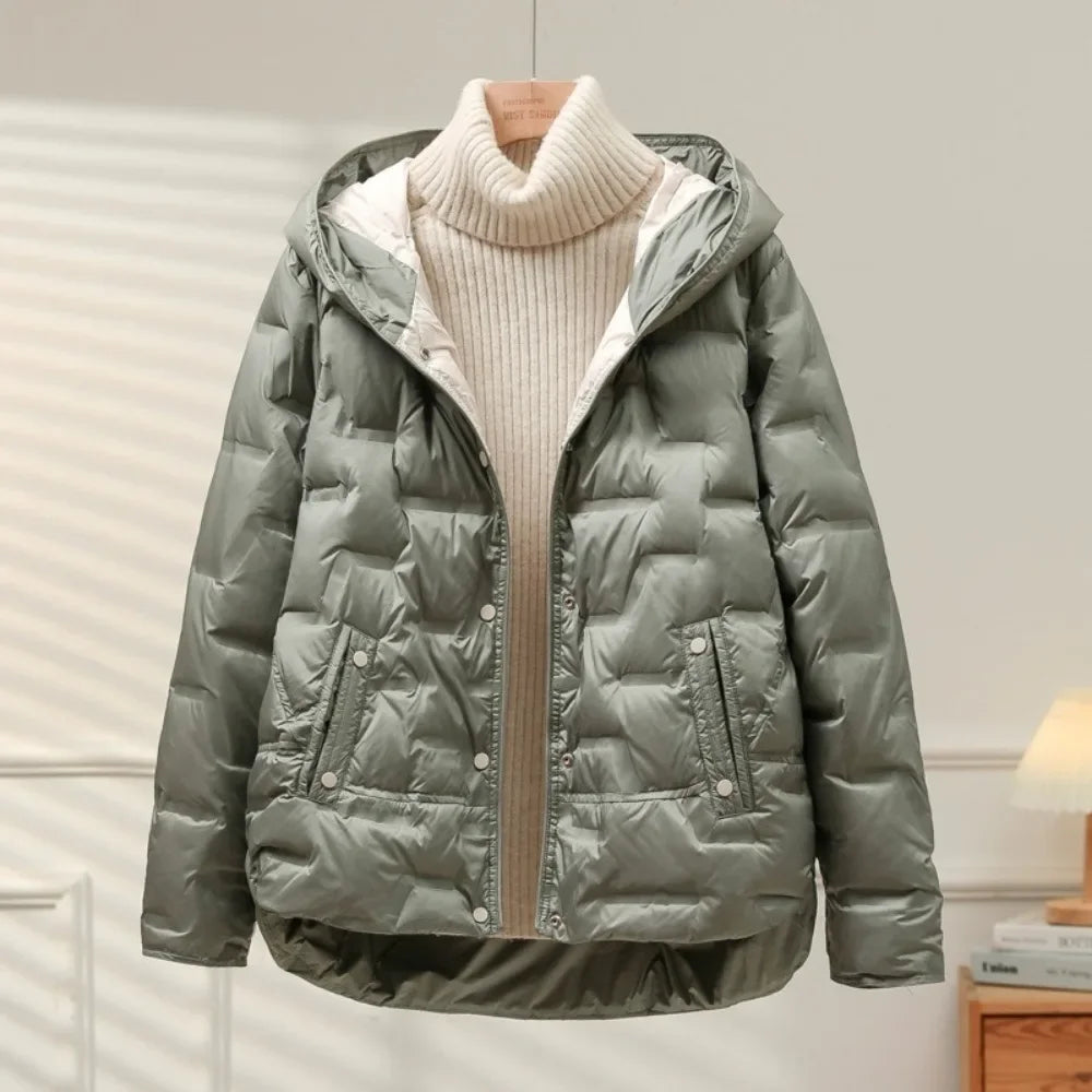 Stylish women's winter puffer jacket, versatile outerwear for modern cold weather fashion.