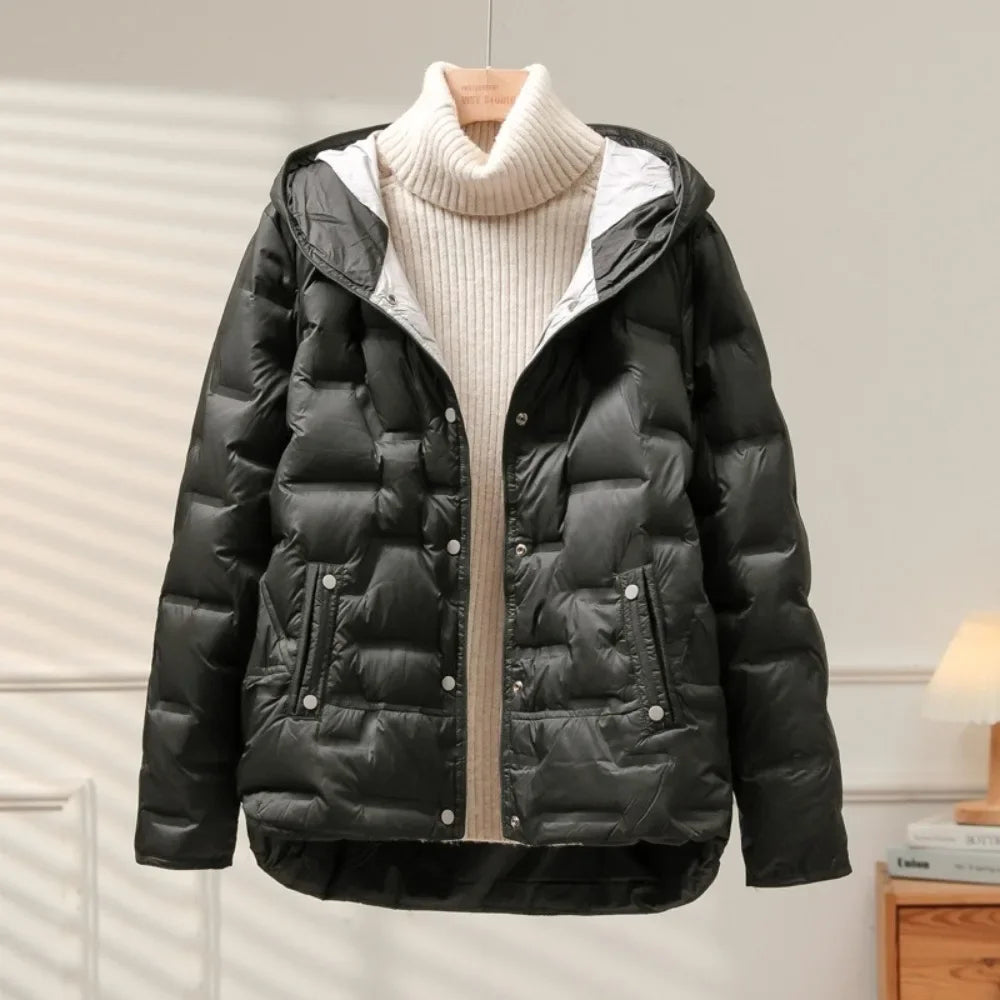 Modern women's quilted puffer jacket, combining warmth, style, and comfort for winter.
