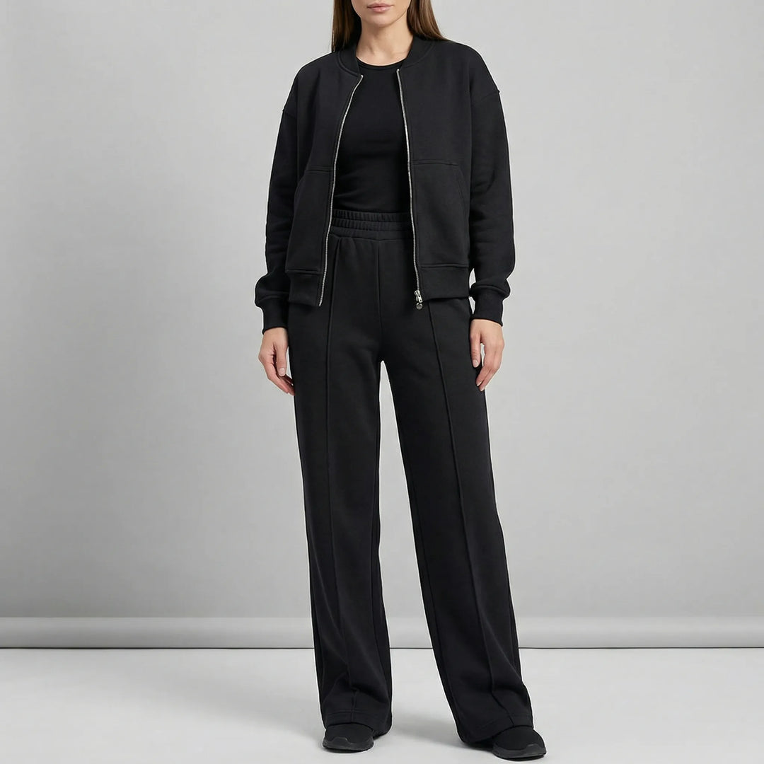 Elegant women's two-piece straight leg trousers and blazer set, perfect for work or sophisticated casual.
