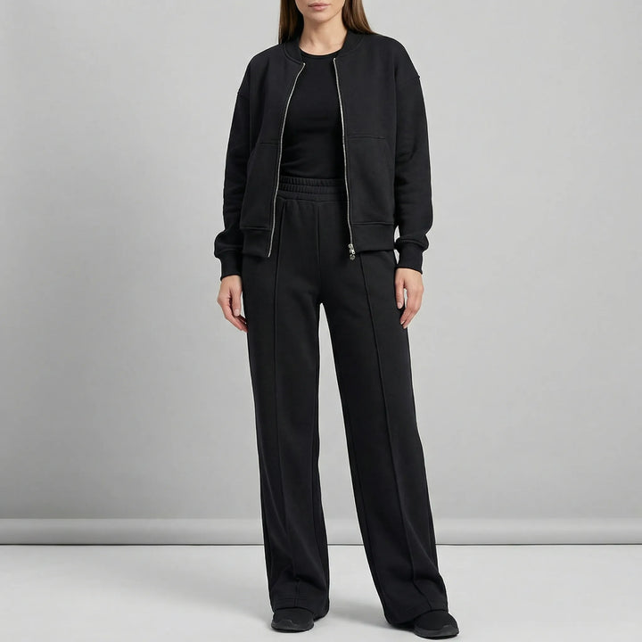 Elegant women's two-piece straight leg trousers and blazer set, perfect for work or sophisticated casual.