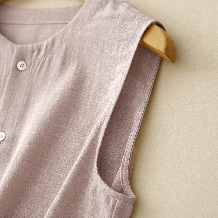 Elegant ladies sleeveless top with a unique asymmetrical design, ideal for chic casual or modern summer outfits.
