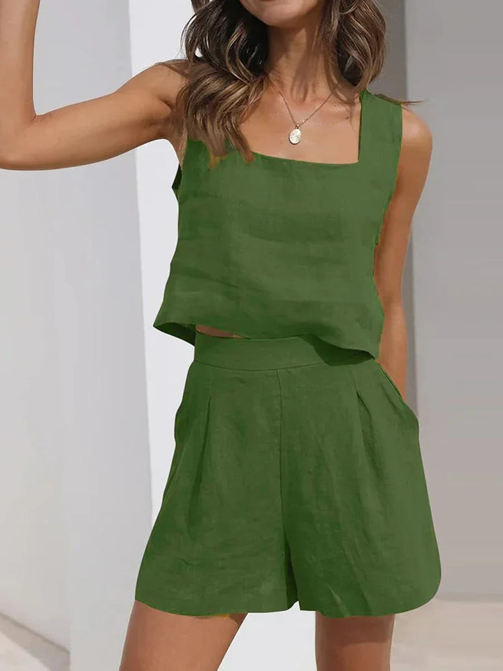 Stylish women's sleeveless crop top and shorts matching set, a comfortable two-piece for summer vacation.