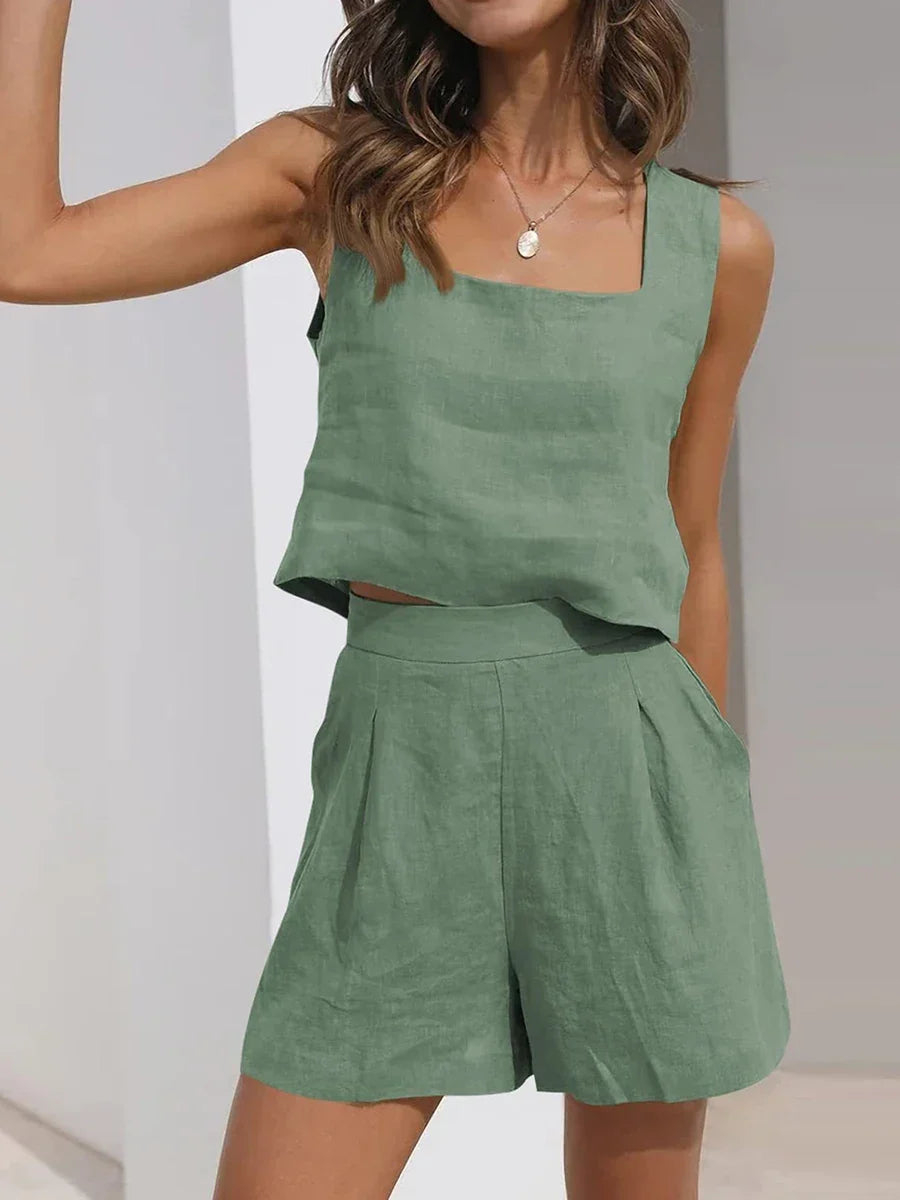 Simple yet chic women's sleeveless crop top and shorts matching set. Versatile two-piece for summer or casual.