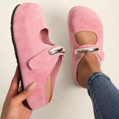 Women's chic suede loafers with a metallic detail, versatile and comfortable for various casual looks.