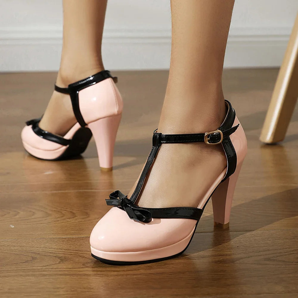 Elegant women's party shoes: T-strap block heels with a stylish bow, perfect formal footwear.