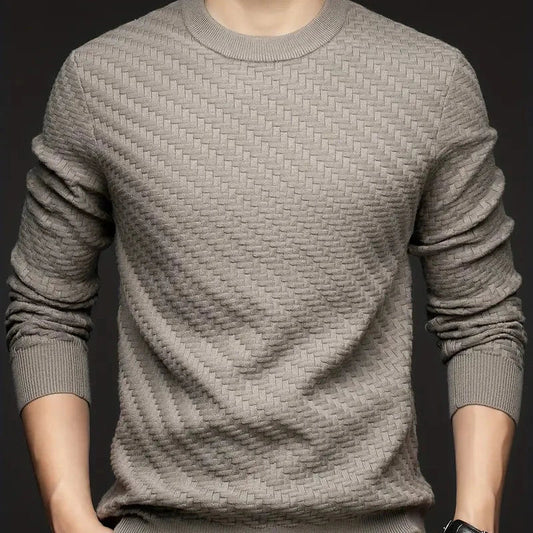 Chic women's textured knit sweater in a cozy, relaxed fit, perfect for stylish fall and winter wear.