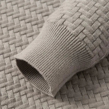 Versatile women's textured knit sweater; a cozy, chic long sleeve top for casual or elegant winter wear.